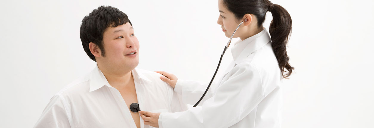 A doctor specializing in weight loss management meets with a patient at Baptist Memorial Hospital